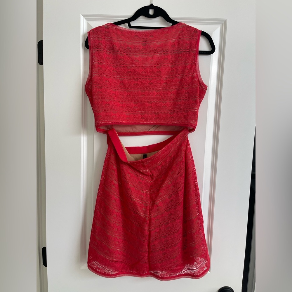 BCBGMaxAzria Red Mini Skirt Set Cut Out Cocktail
Never been worn,